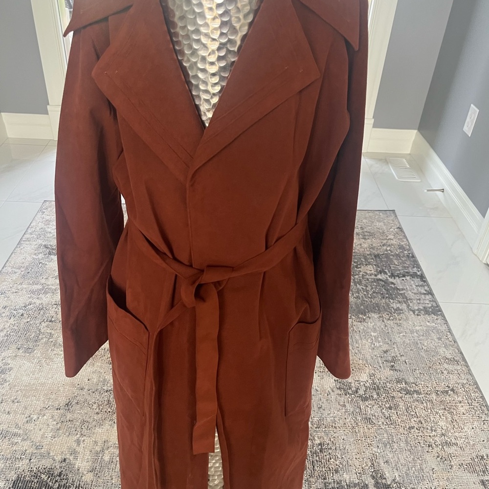 A fabulous vintage 1970s rust coloured ultra suede wrap coat by famous bridling